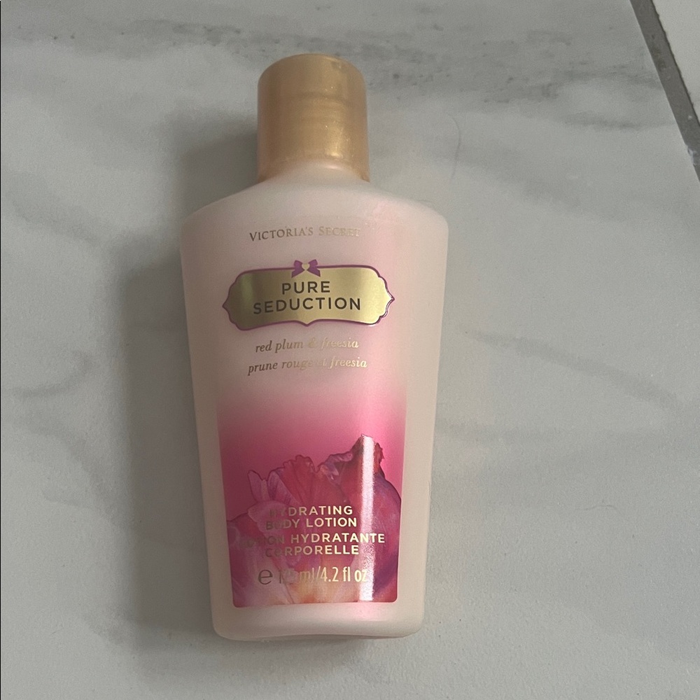 Victoria's Secret Pure Seduction Lotion 4.2 fluid ounces new in the box.